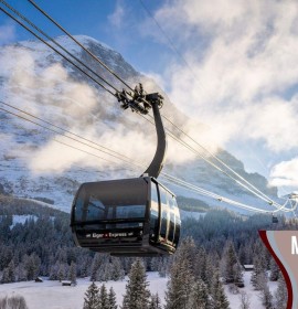 A serene ski lift against a snowy mountain backdrop, depicted in crisp blues and whites, evokes a peaceful yet adventurous vibe for winter sports enthusiasts.